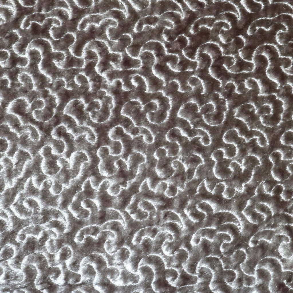 Monte Carlo-Embroidered design on a metallic panne velvet